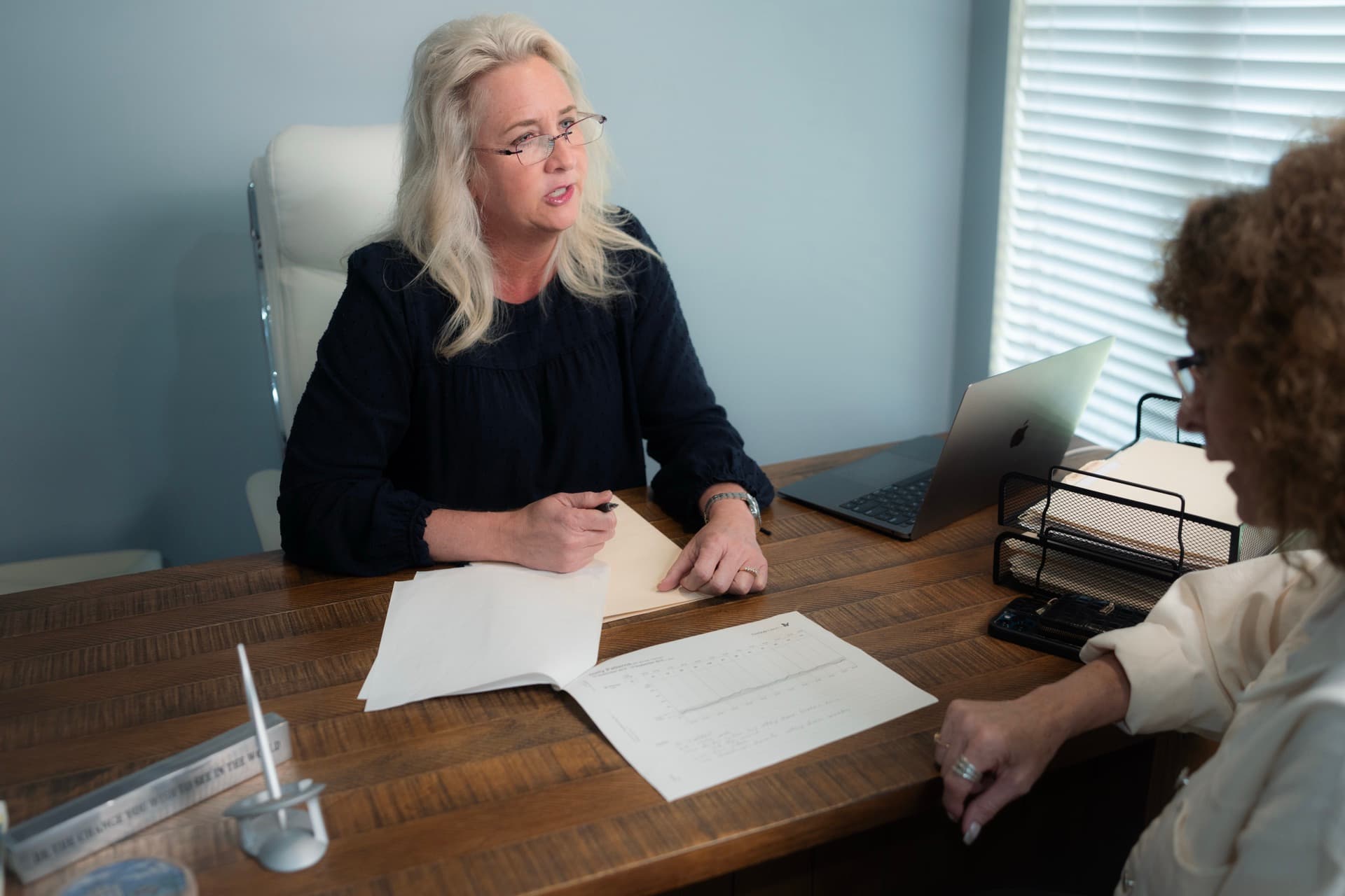 Teresa walking a patient through her lab results line by line