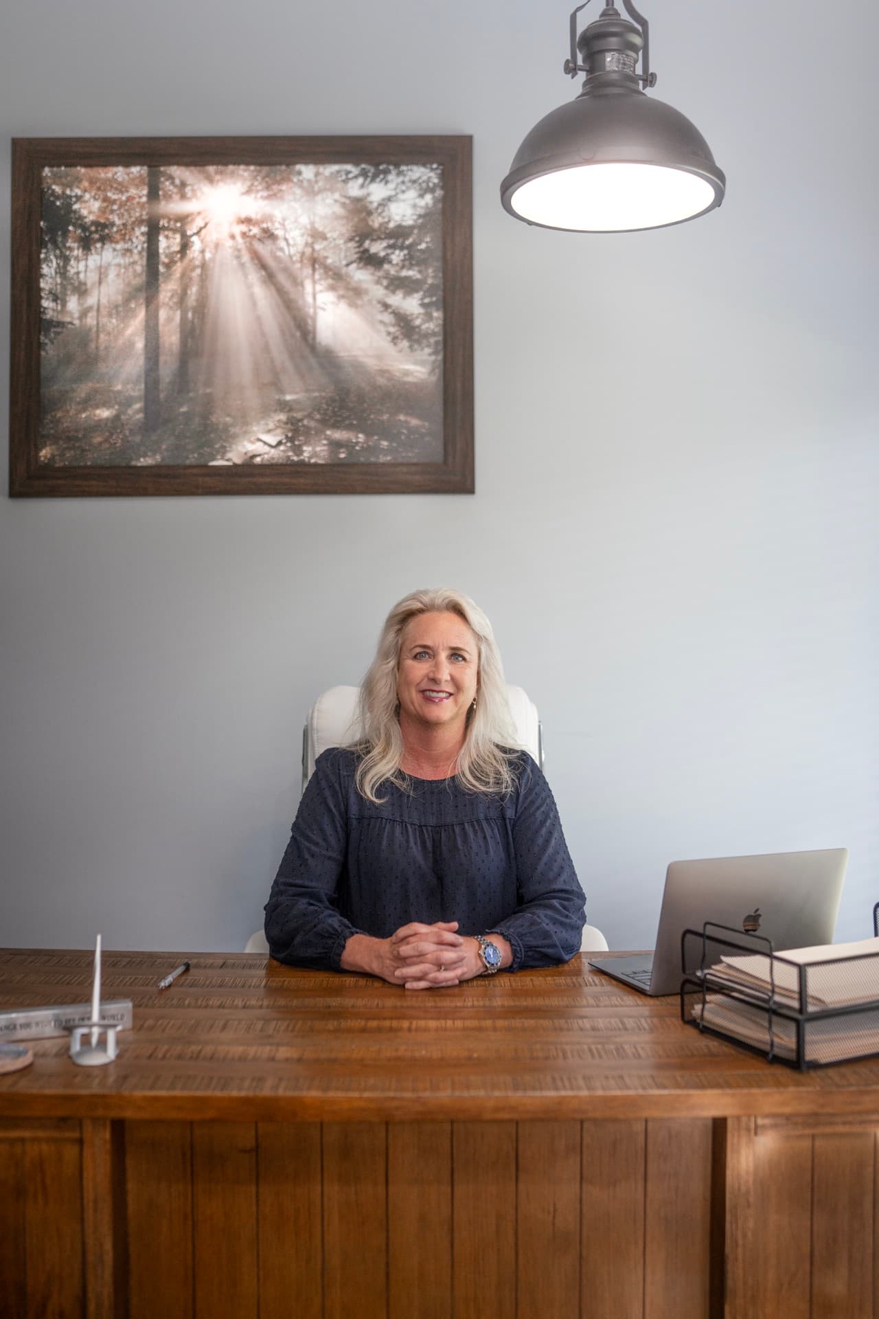 Teresa, provider and co-founder of Total Health & Wellness, at her desk in Springfield, Missouri